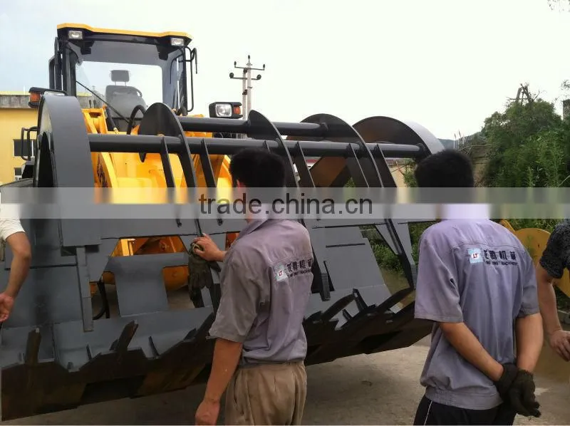 LTMA log loader for timber wheel loaders with clamp