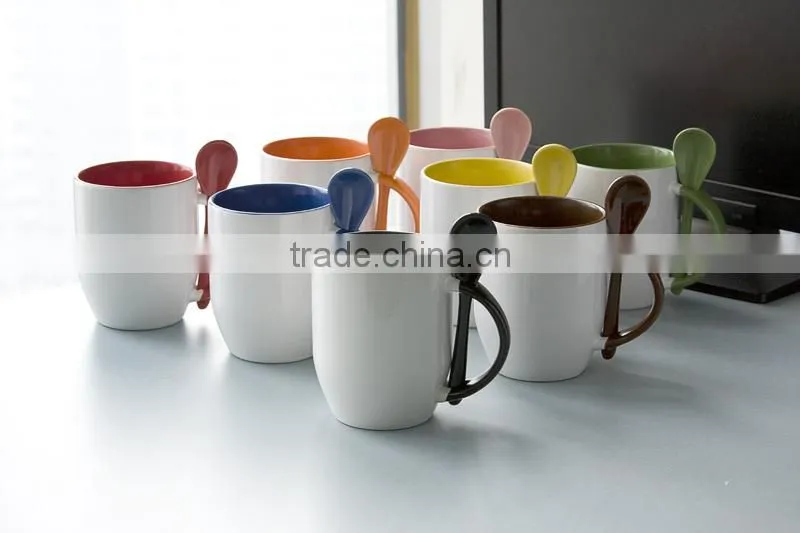 pink color ceramic cup with spoon
