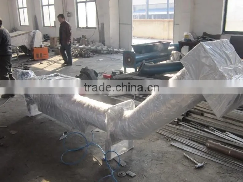 Municipal sludge dewatering shaftless screw press