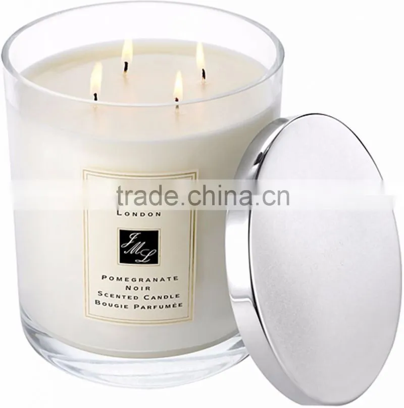 4 wicks scented candle in glass jar with metal lid
