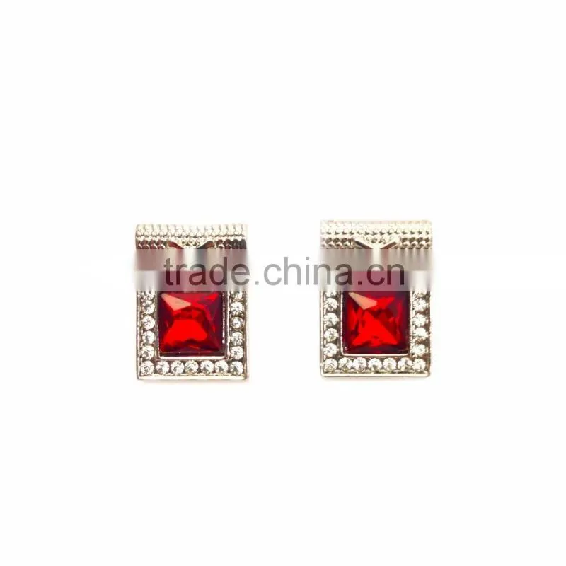 large red crystal surrounded by clear microset crystals necklace and earring