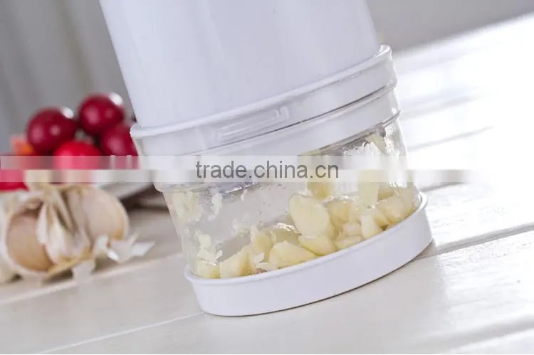 garlic cutter/garlic press