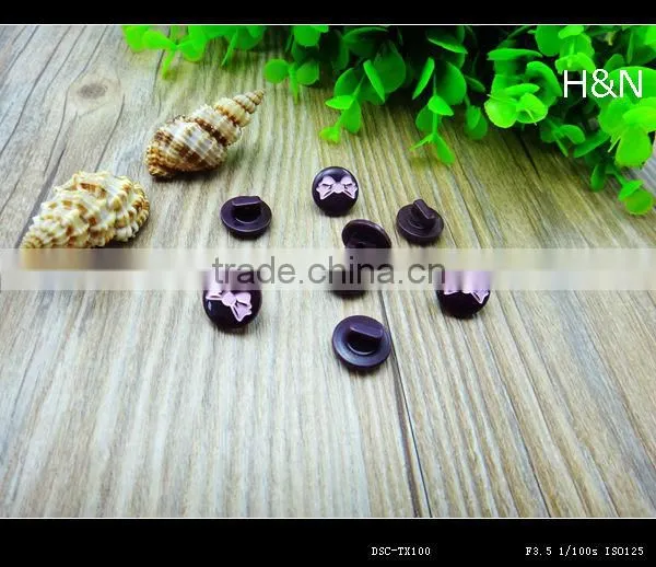 22L laser engraved butterfly pattern resin shank button