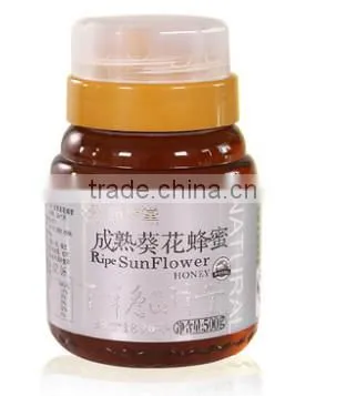 Mature sunflower pure honey in bulk or bottle packaging