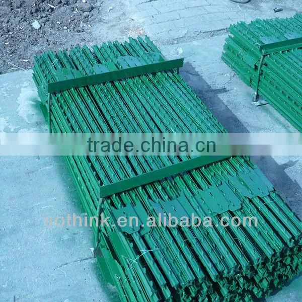 green painted farm fencing used t bar fence post