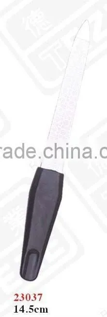 white plastic handle nail file