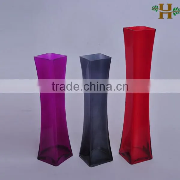 Red tall glass vases for centerpieces
