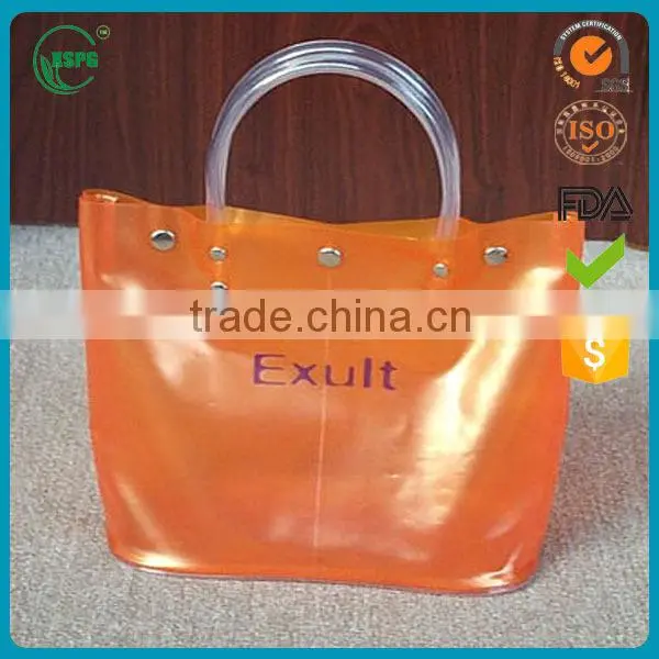 Pvc packaging hand bag with flexiloop handle