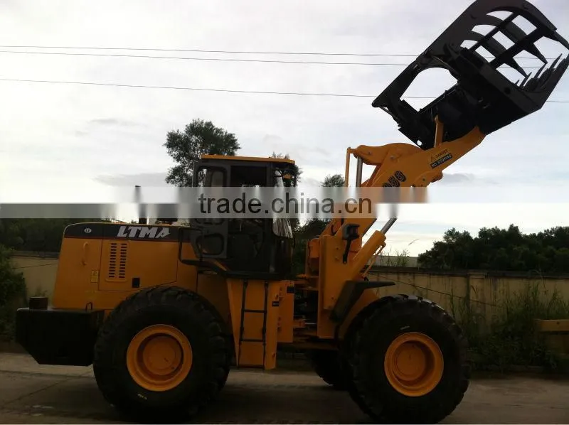 LTMA grass wheel loader with log grapple