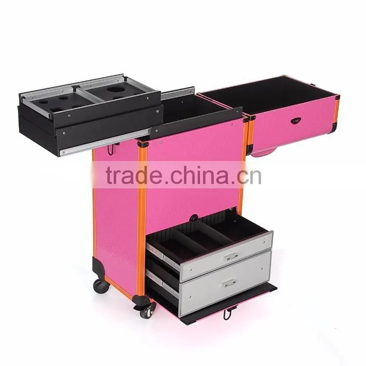 Pink rolling makeup case with trays