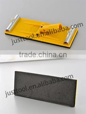 Sanding block with rotary handle