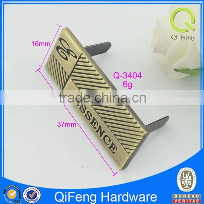 Q-3404 metal brand logo label profession in bag market