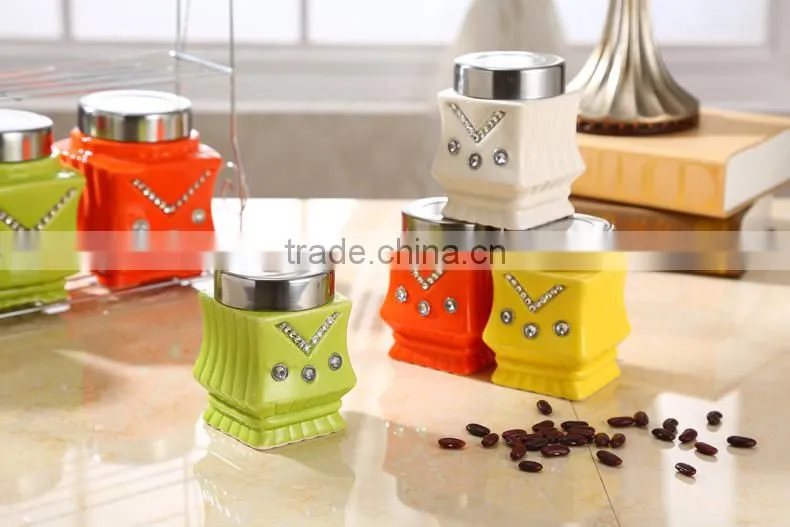 ceramic storage jar with metal stand