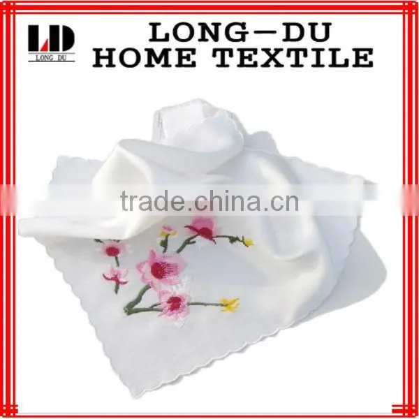 The white embroidered handkerchief