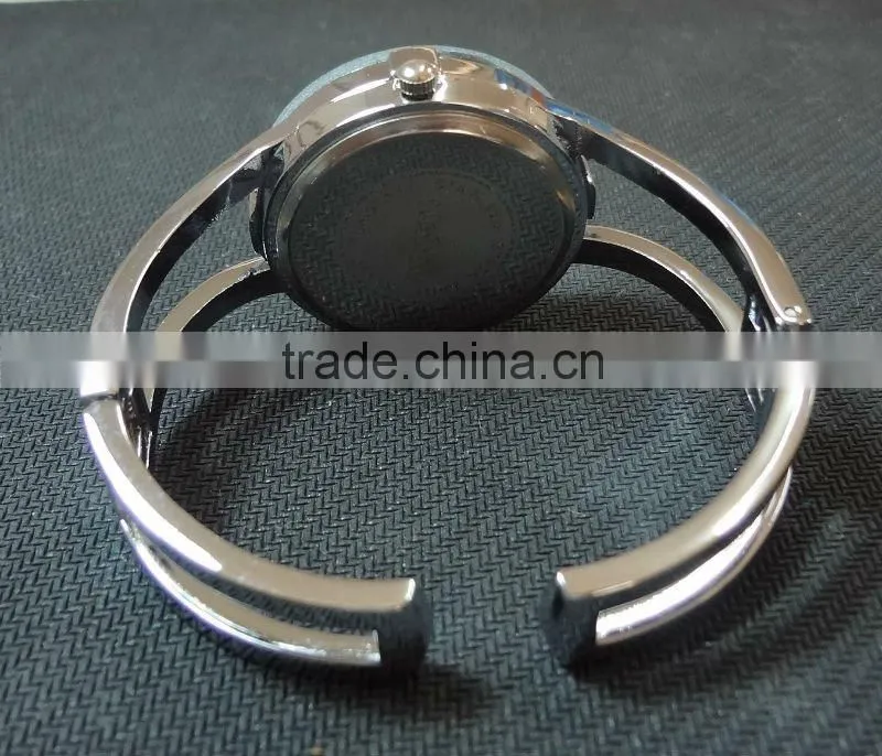 Floating bead deep blue cuff watch