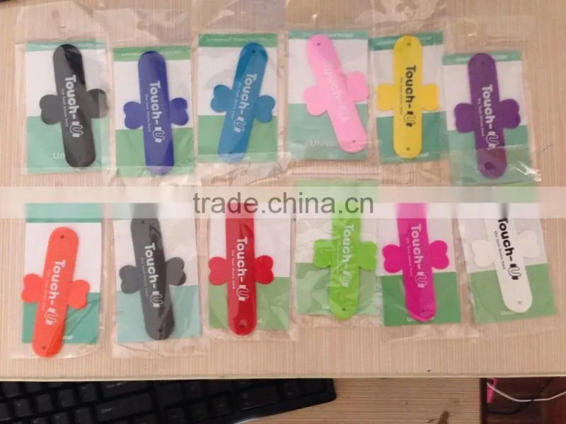 2014 promotional one touch silicone slap smartphone Holder