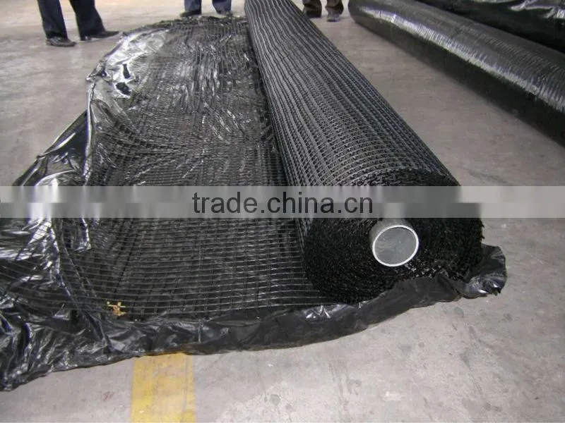 Bitumen coated fiberglass geogrid