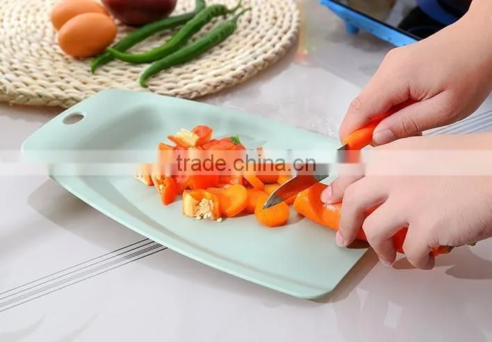 Multi-function plastic cutting board with hook