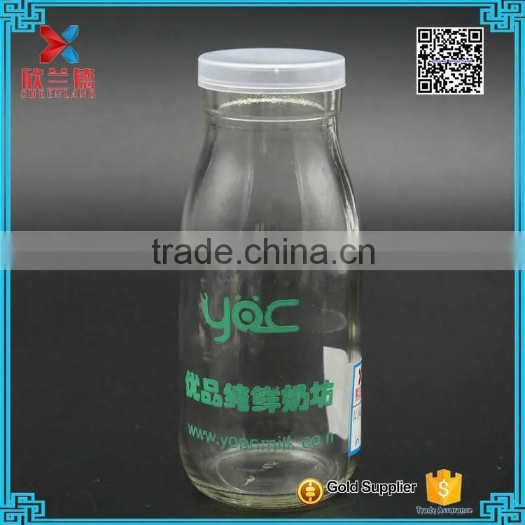 250ml glass milk pudding juice bottle jar with transparent plastic cap and logo screw printing