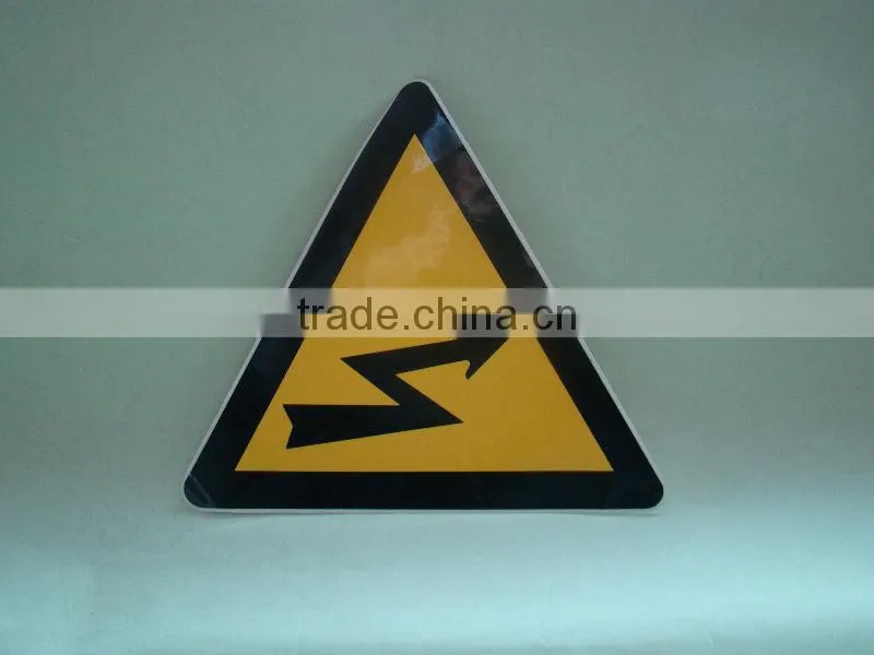 hanging construction sign with holes