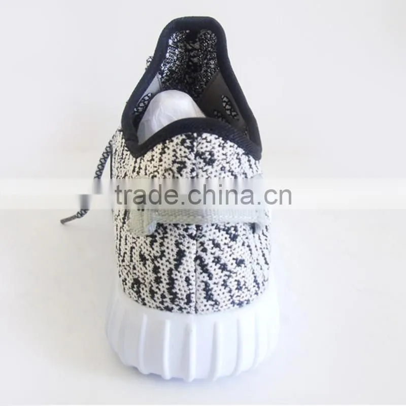 Good selling black and white color basketball shoes men with EVA outsole