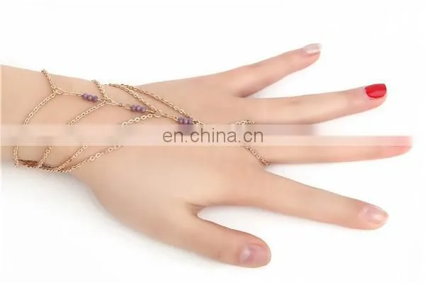 Delicate hand chain bracelet, slave bracelet with ring to finger attachment