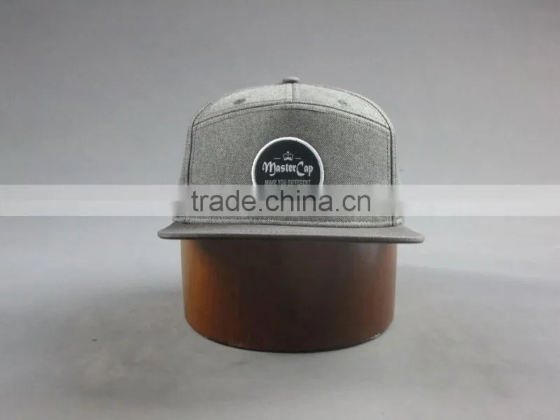 Custom 100% cotton twill 7-panel snapback cap with embroidery logo
