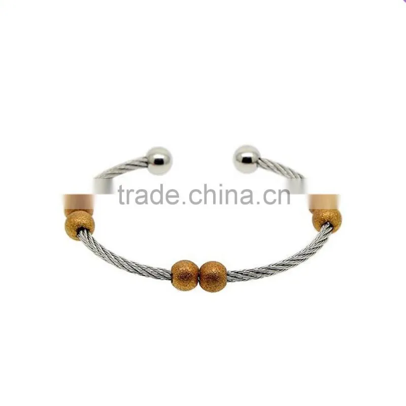 2016 hot sale stainless steel wire bangle with gold plated sand blast beads