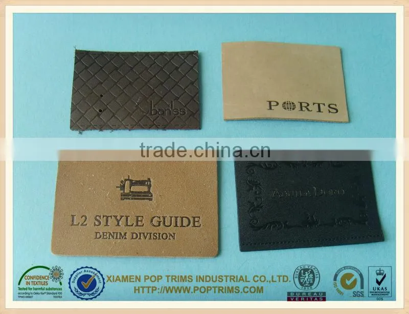 Genuine customized jeans leather label with embossed logo for garment