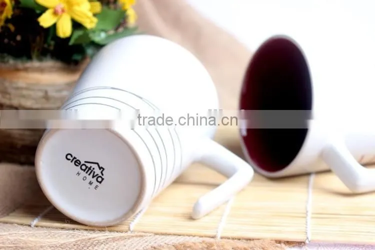 High quality stoneware tea mug with unique handle from china