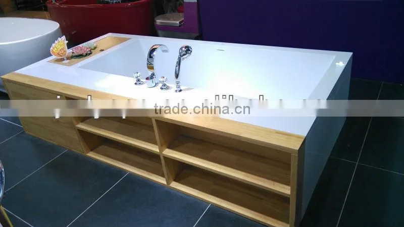 stone bathtub,wood cabinet,solid stone bathtub