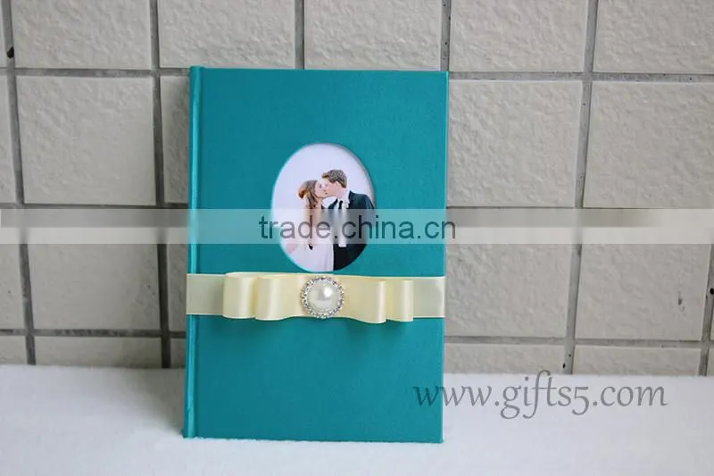Unique wedding guest book with ribbon bow