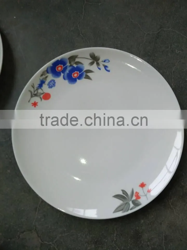 10.5inch ceramic moon shaped plate with flower design for Cameroon