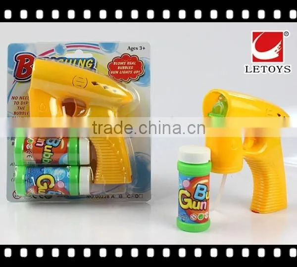 factory supply solid color bubble gun with 2 bottles bubble water