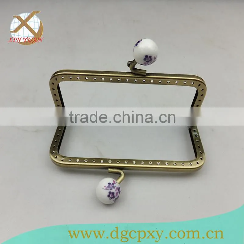 ceramic head metal frame for purse