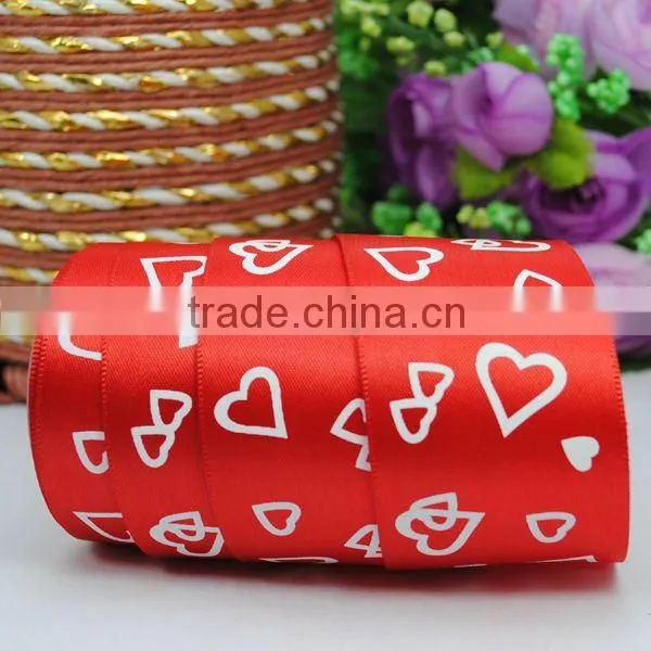 print custom ribbons wrapping around gift boxes