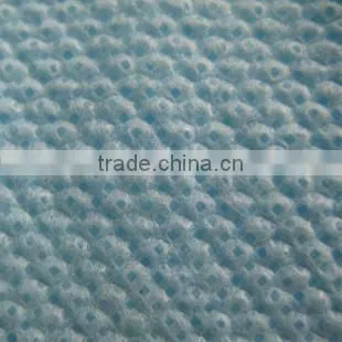 Double location for the cutting and rewinding non-woven punching machine