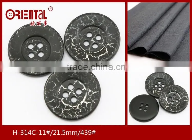 High end 4 holes black plastic lady's suit button with crack finish