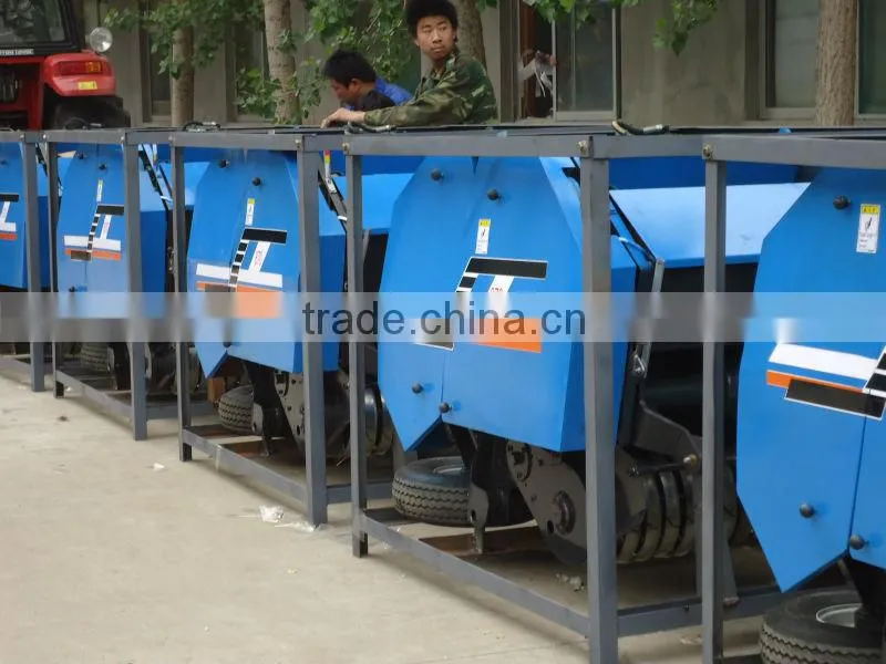 PTO linked round hay baler