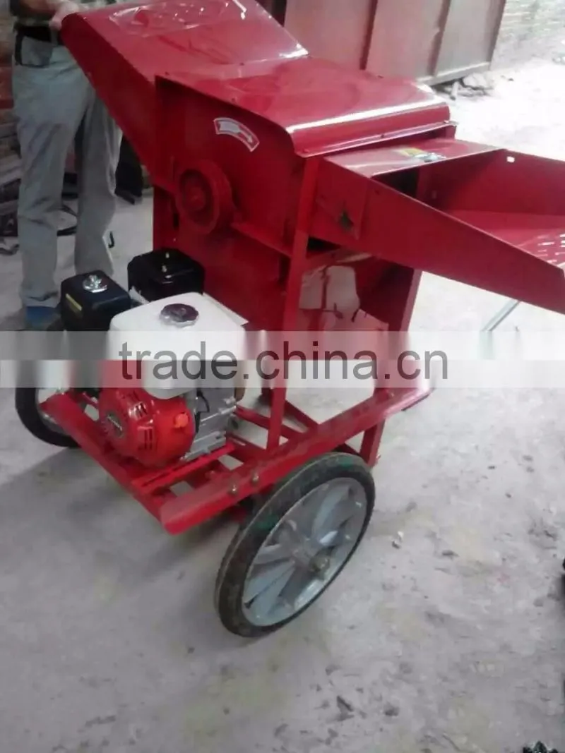 Movable mini paddy grain thresher