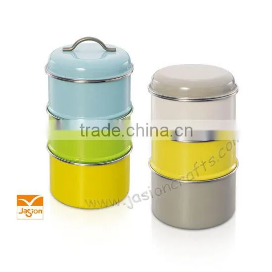 Colorful metal canister for confectionery or tea storage in kitchen pantry or for party catering