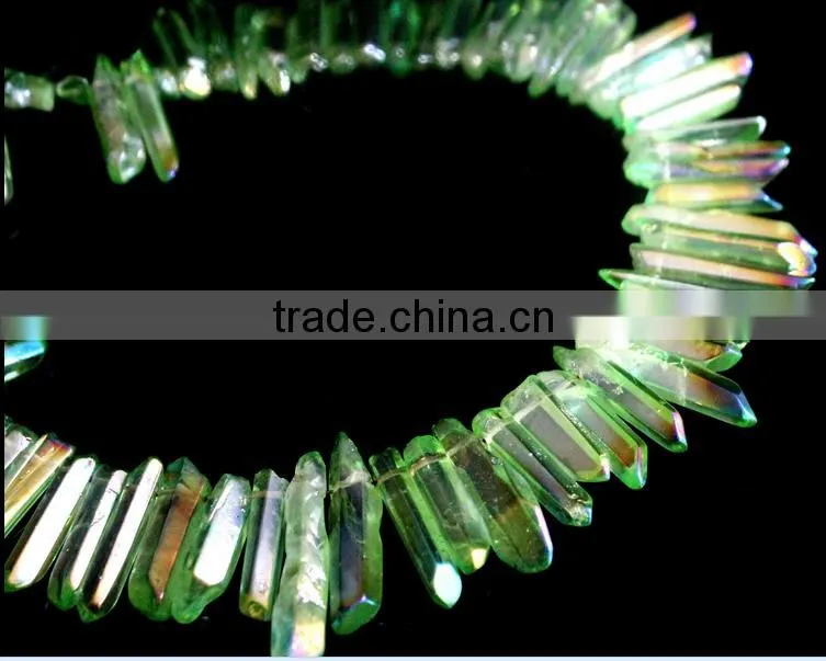 Green aura of titanium coating on quartz crystal necklace for healing