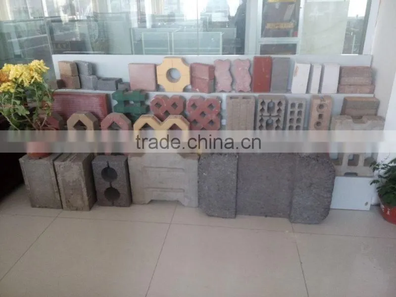 QT4-15 videos of working of concrete brick machines