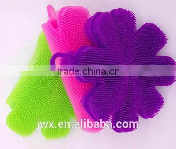 Pink silicone face washing brush for household usage