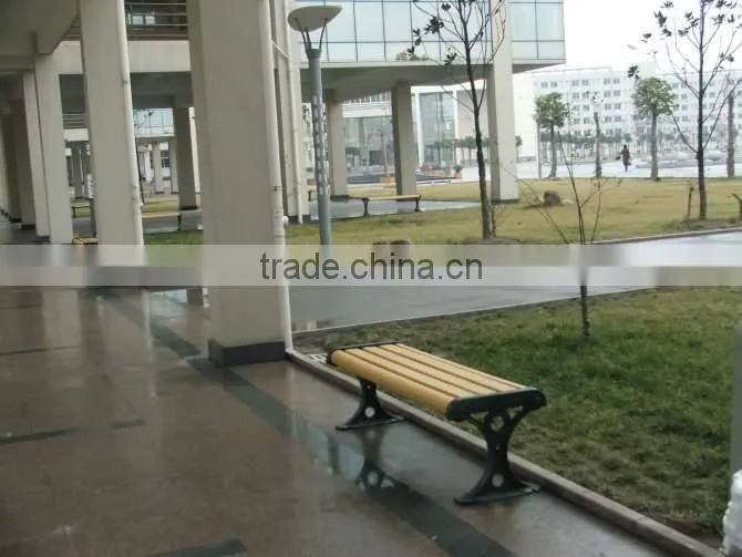 classic wooden garden bench with metal legs