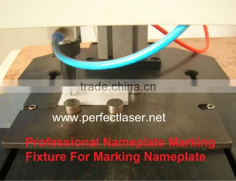 Vehicle nameplate with QA gears dot peen marker equipment