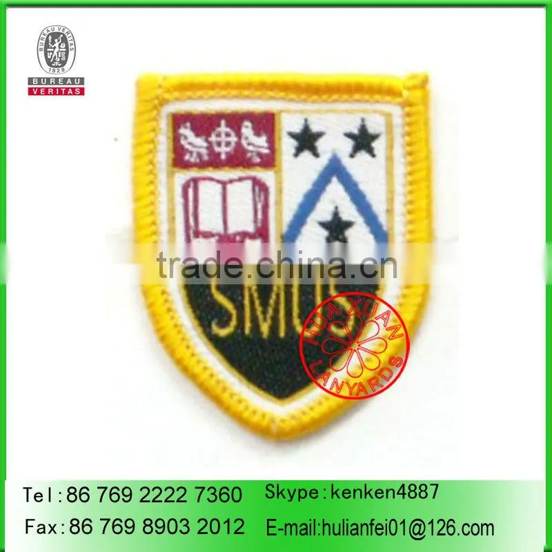Woven badge for garments