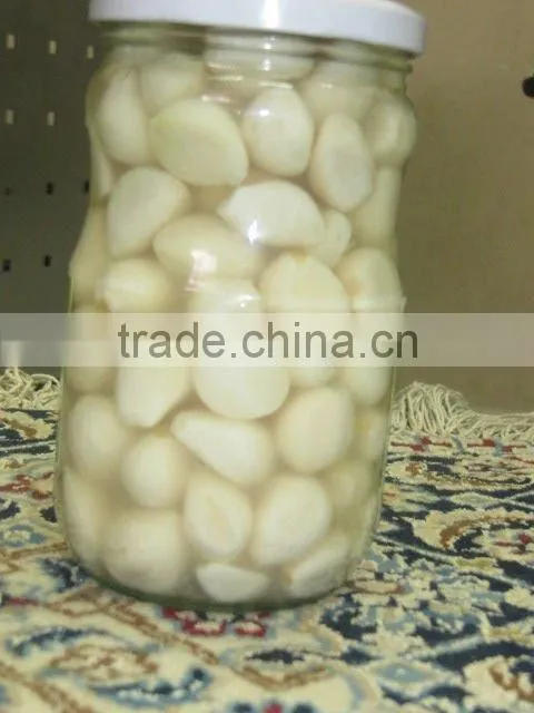 Garlic Cloves In Brine In Glass Jar