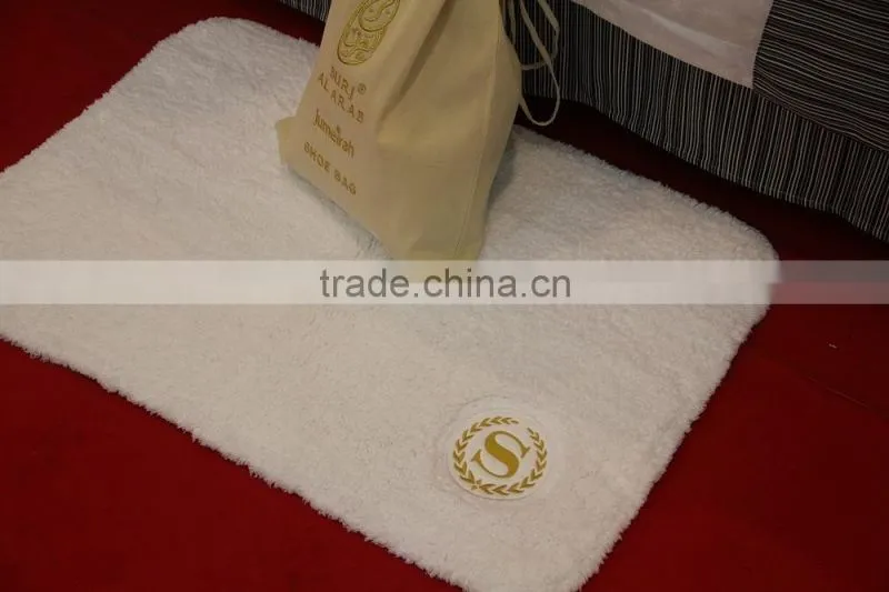 high quality hand tufted shaggy mat with embroired logo