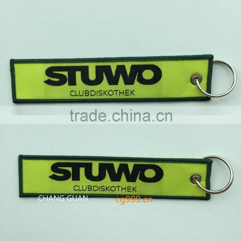 The bottle opener woven label bag charms